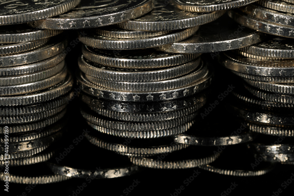 Swiss coins on a black background Swiss coins on a black background