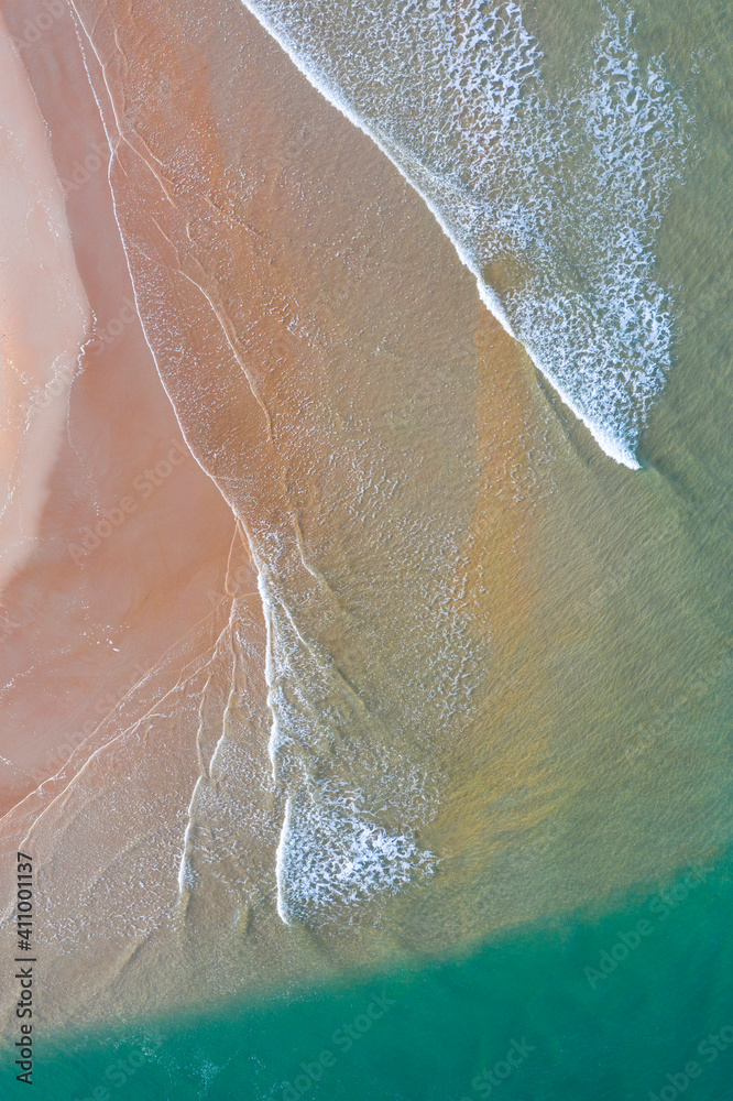 Fototapeta premium Playa de la Rabia and Arroyo del Capitan. Aerial view at low tide. Oyambre Natural Park, San Vicente de la Barquera, Cantabrian Sea, Cantabria, Spain, Europe