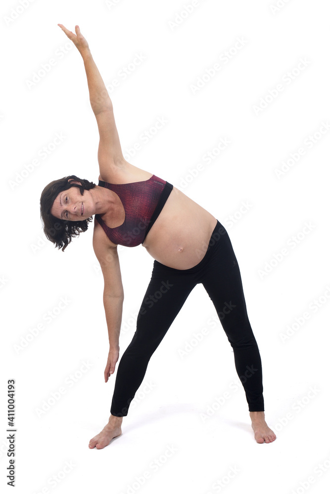 portrait of a pregnant woman exercising on white background,trikonasana, portrait of a pregnant woman exercising on white background,trikonasana,