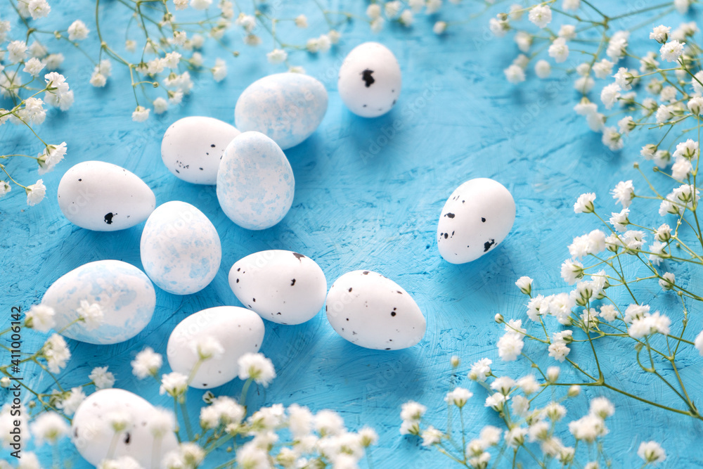 White egg easter and white flowers on blue background. Banner, flatly, Easter greeting card White egg easter and white flowers on blue background. Banner, flatly, Easter greeting card