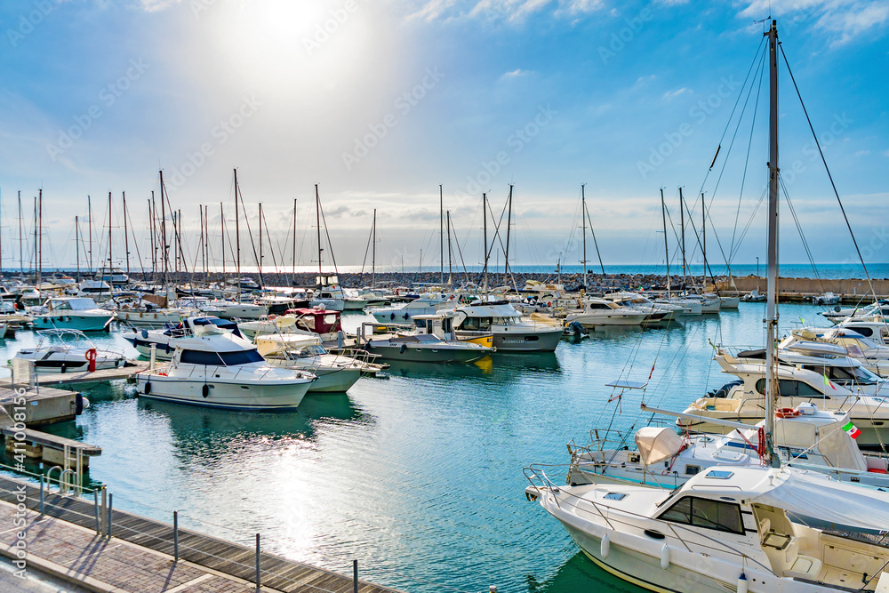 The harbor and the Marina of San Vincenzo with moored boats in San Vincenzo, province of Livorno, Tuscany region, Italy
