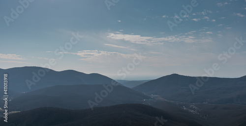 Mountains landscape with blue sky background