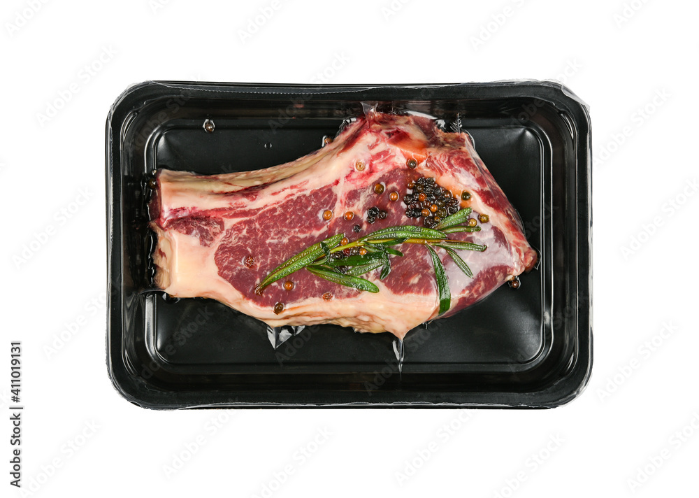 Close up raw beef ribeye steak vacuum sealed Close up raw beef ribeye steak vacuum sealed