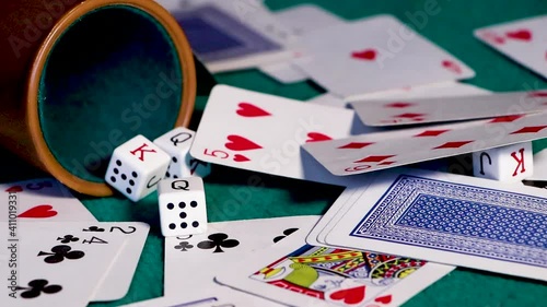 poker cards falling on the gaming table