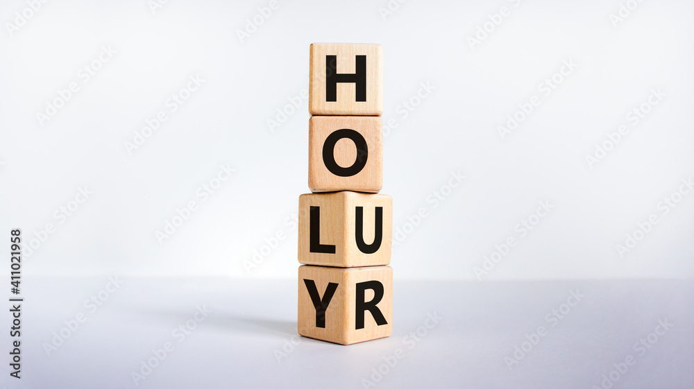 Holy hour symbol. Turned wooden cubes with words holy hour. Beautiful white background, copy space. Religion and holy hour concept. Holy hour symbol. Turned wooden cubes with words holy hour. Beautiful white background, copy space. Religion and holy hour concept.