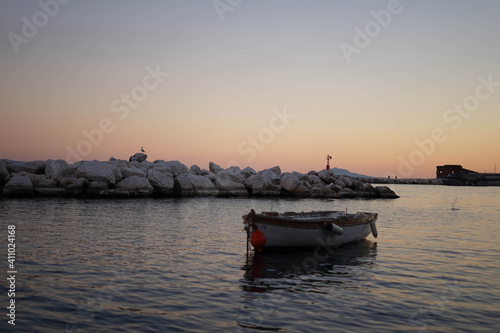 ship in the sunset with the vesuvius