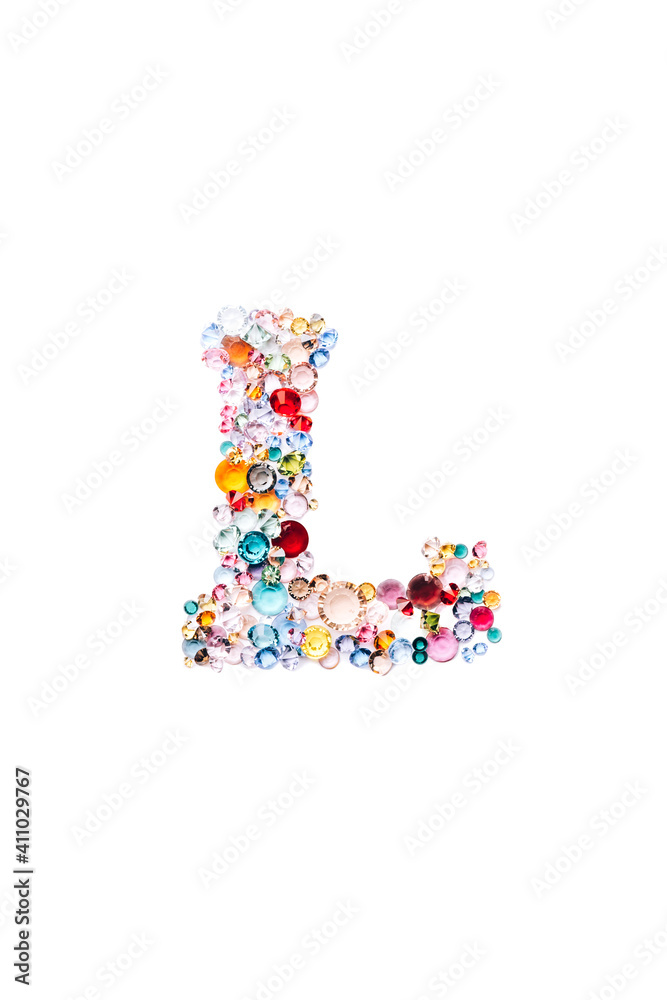 Letter L made from beautiful glass bright gems or crystals on isolated white background Letter L made from beautiful glass bright gems or crystals on isolated white background
