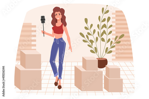 Blogger unpacking. The girl unpacks the boxes and reviews the packages on video.