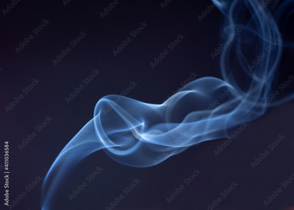 blue jet wave of smoke isolated on black background blue jet wave of smoke isolated on black background