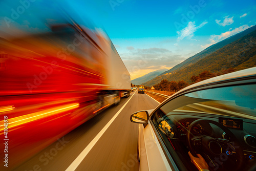 Car in motion blur driving in the Italian mountains © pozdeevvs