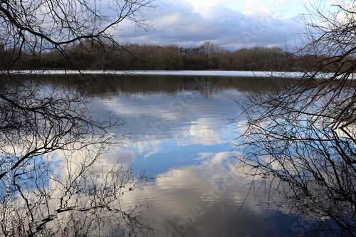 Cloudy reflections on lake landscape