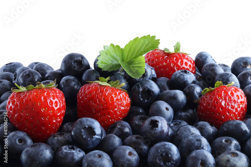 fresh blueberries and strawberries on a white background, fruits