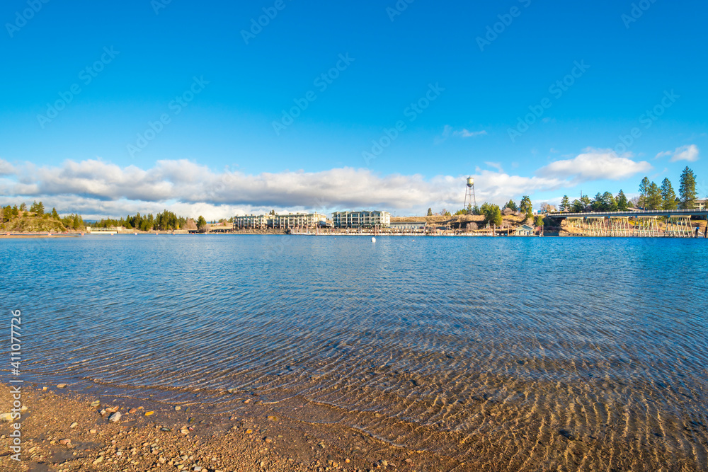View of an upscale waterfront condominium community with marina along the Spokane River in the town of Post Falls, Idaho, USA