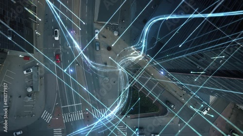 Big City Businessman Uses Smartphone, Stands on Crowded Street. E-Commerce Visualization of Information Lines Flying from Mobile Phone into Global Digital Network. Top Down Zoom out Aerial Drone Shot