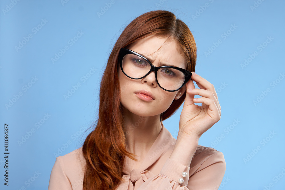 woman wearing glasses pink shirt elegant style attractiveness blue background woman wearing glasses pink shirt elegant style attractiveness blue background