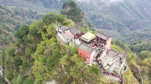 aerial view of wudang mountain, the pilgrimage was crowded,the golden palace on highest peak, taoist holy land, hubei province, China photo