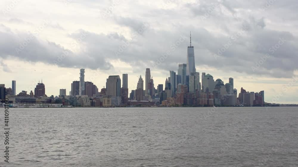 Downtown Manhattan, seen from Hoboken, Dark Clouds passing over Manhattan and waves on the Hudson River Downtown Manhattan, seen from Hoboken, Dark Clouds passing over Manhattan and waves on the Hudson River