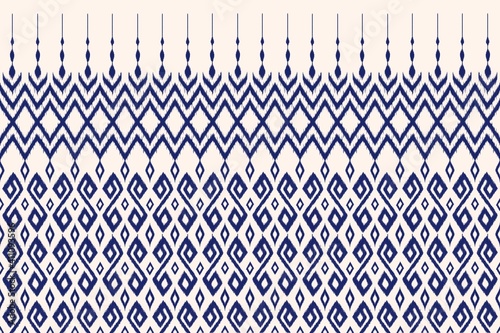 Diagonal ikat stripes. Zigzag pattern seamless. Geometric chevron abstract illustration, wallpaper. Tribal ethnic vector texture. Aztec style. Folk embroidery.