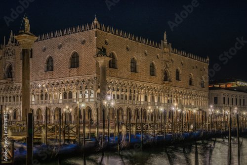 Scenic Night view of Doge's Palace (Palazzo Ducale) and illuminated St. Mark's square, Venice, Italy