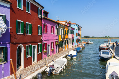 Tradition colorful houses along Rio del Pontinello canal in Burano, Venice, Italy © Francesco Bonino