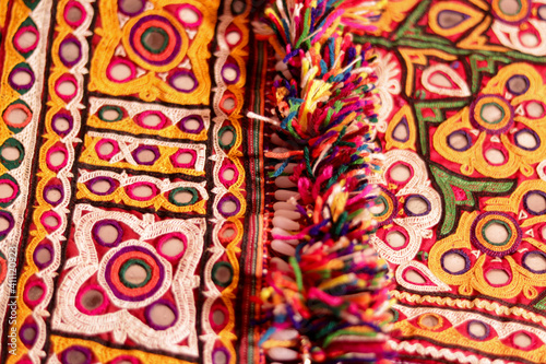 Embroidery art work view,handmade tribal skirt with embroidery and mirror work,colorful handmade ahir bharat, kutchhi bharat,Seamless striped pattern in India, © Dinesh
