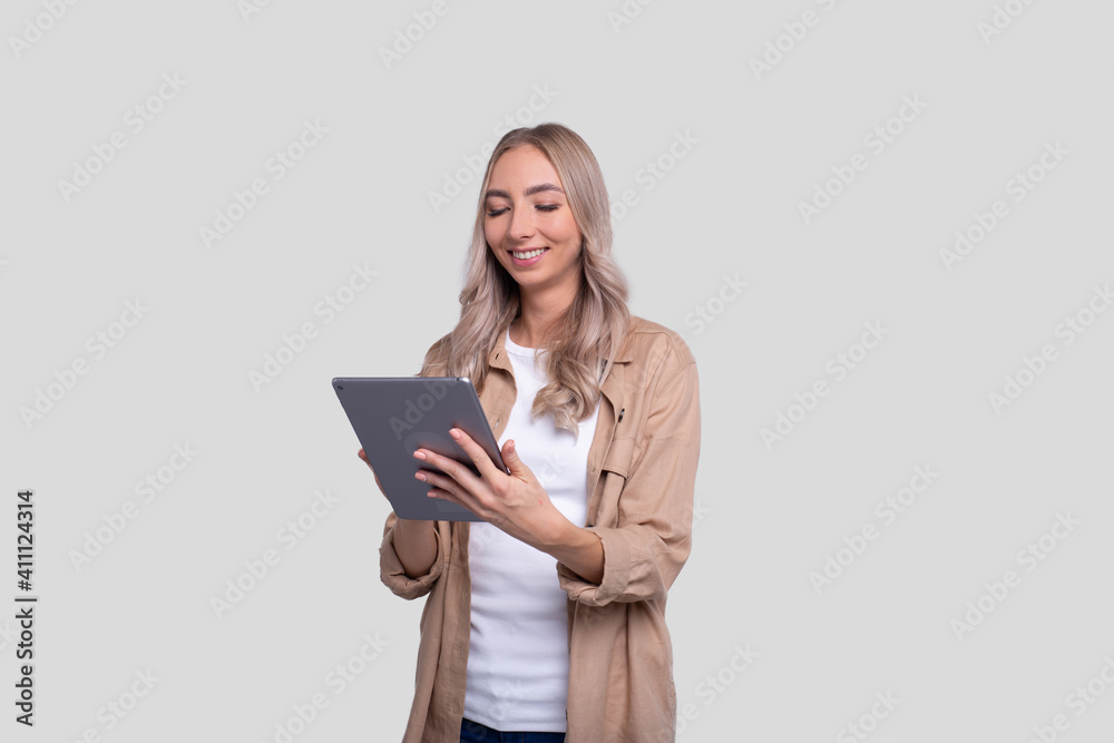Girl Holding Tablet Green Screen Standing Isolated. Girl Working with Tablet. Commecial, Shopping, Advertisment Concept Girl Holding Tablet Green Screen Standing Isolated. Girl Working with Tablet. Commecial, Shopping, Advertisment Concept