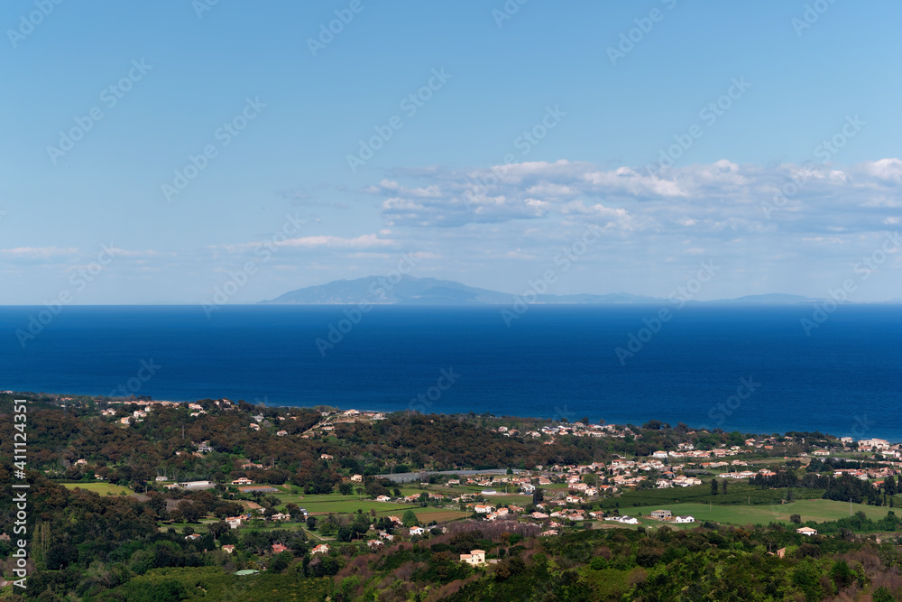Elba island and  Moriani-plage village in the  eastern coast of Corsica