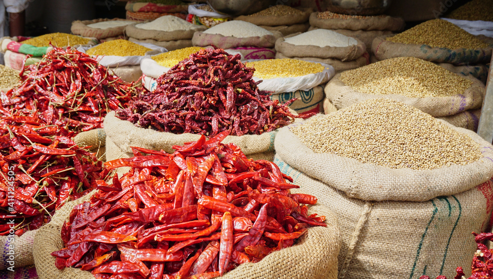 Sacks of food and spices at an Indian spice market, Old Delhi
