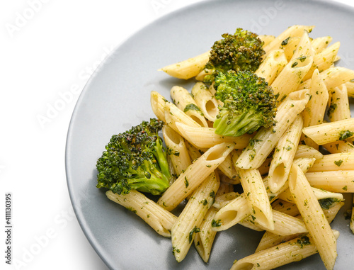 Plate with tasty pasta on white background, closeup