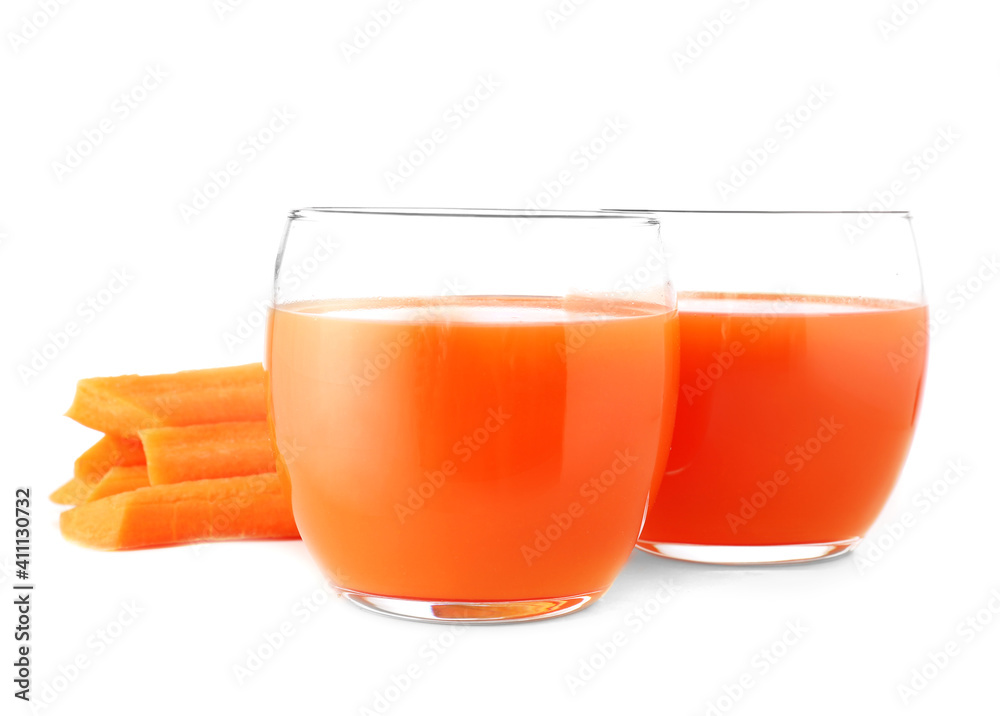 Glasses of fresh carrot juice on white background Glasses of fresh carrot juice on white background