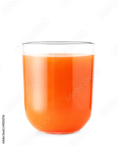 Glass of carrot juice on white background