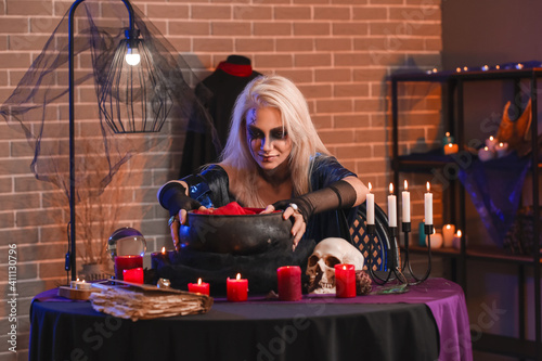 Witch performing black magic ritual