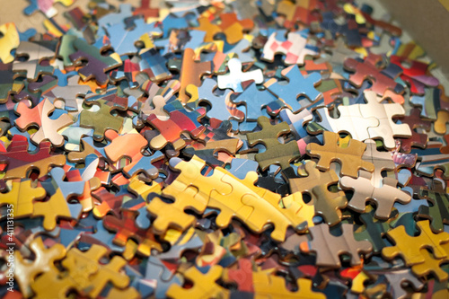 Jigsaw puzzle pieces in a box