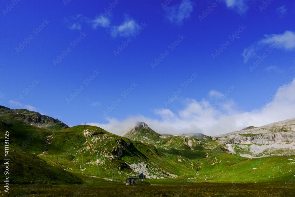 wonderful green hills and mountains with deep blue sky