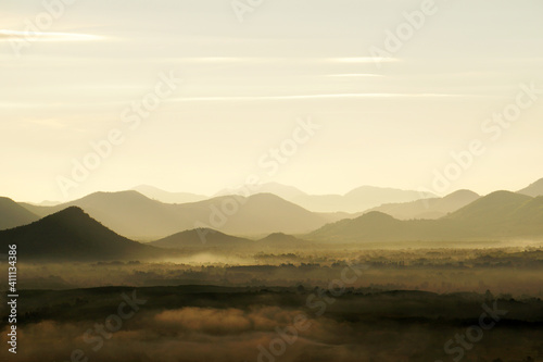 Landscape Mountains with mist fog in the morning - nature scenery from Phuthok Chaing Khan Loei Thailand ,Tourism and travel concept image, Fresh and relax type nature image background 