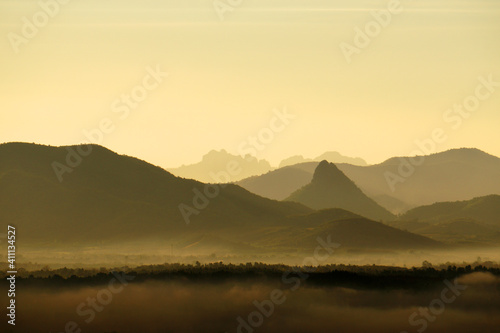 Landscape Mountains with mist fog in the morning - nature scenery from Phuthok Chaing Khan Loei Thailand ,Tourism and travel concept image, Fresh and relax type nature image background 