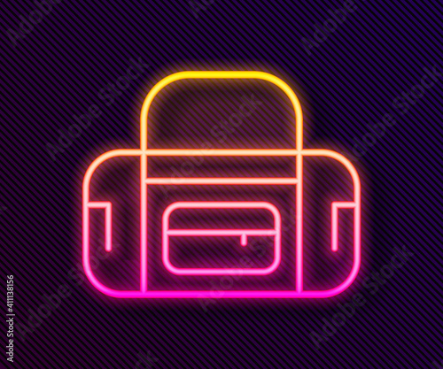 Glowing neon line Sport bag icon isolated on black background. Vector.
