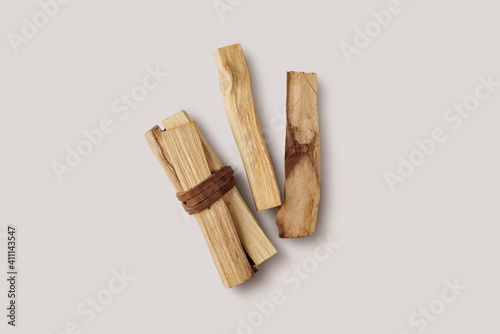 Palo Santo tree stick tied in bunches on a light background. Top view. Organic holy tree incense from Latin America. Color photo close-up of natural frankincense.