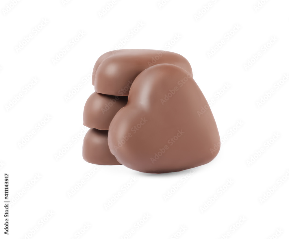 Fototapeta premium Beautiful heart shaped chocolate candies on white background
