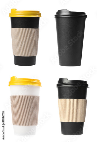 Set with different paper coffee cups on white background
