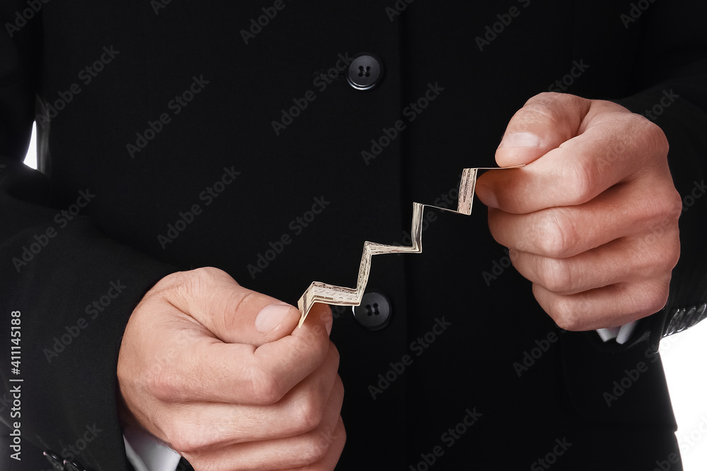 Business man holding money on white background