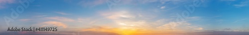 Dramatic panorama sky with cloud on sunrise and sunset time. Panoramic image...