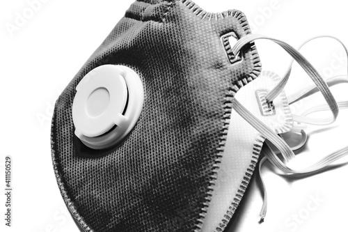 Black and white image of face mask with protection filter. Viruses theme. Healthcare and medicine photo