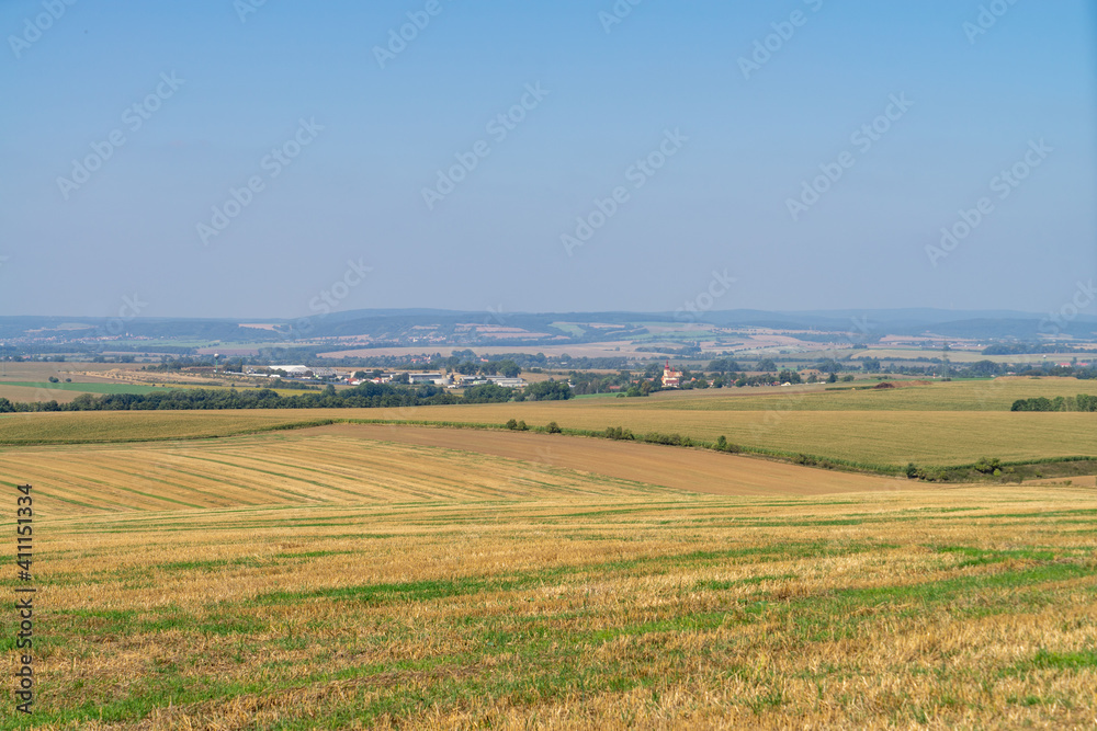 Winding road among South Moravian fields