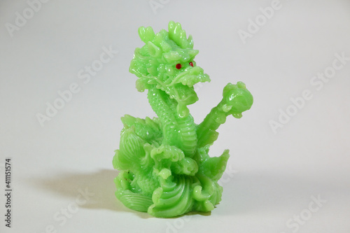 green chinese dragon figurine close-up