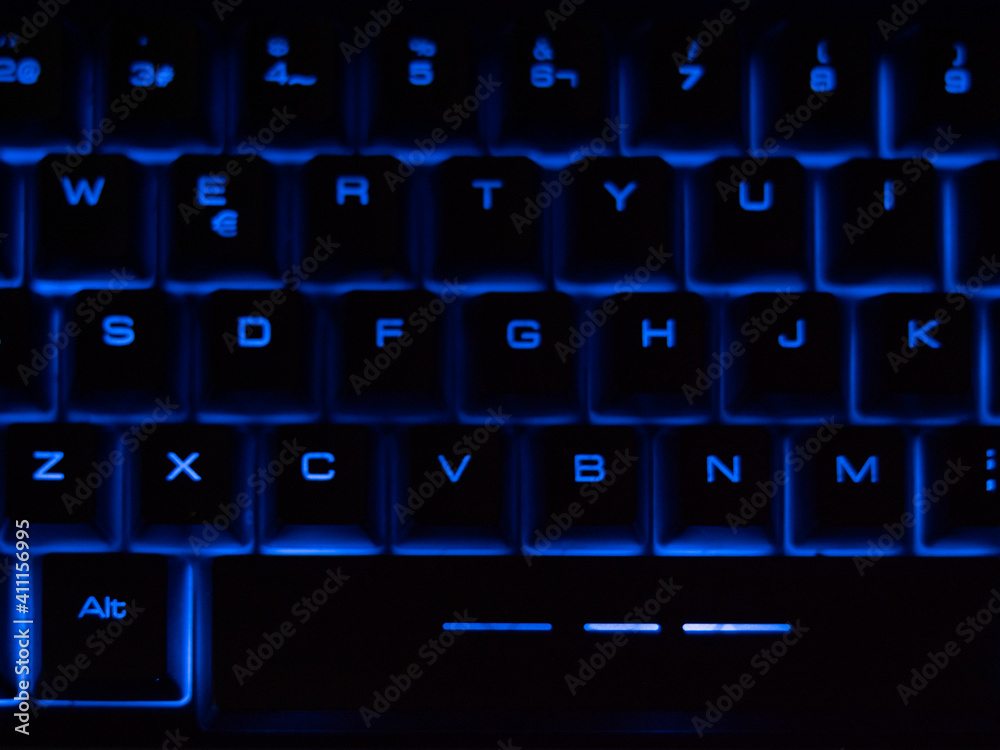 Black keyboard with blue retro light. Black keyboard with blue retro light.