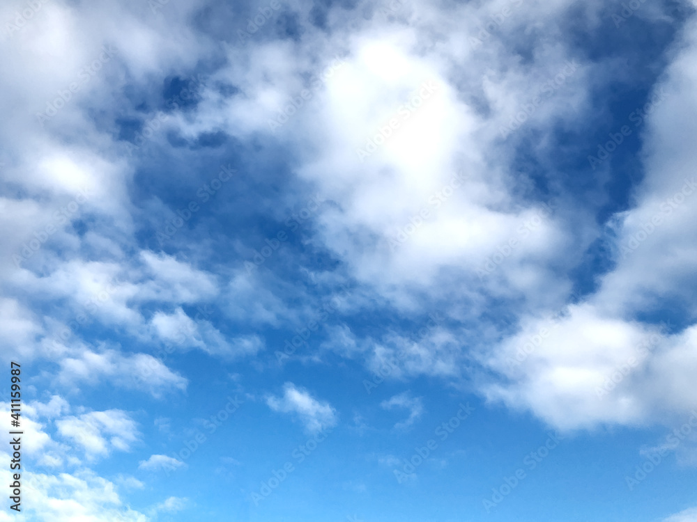 White clouds on bright blue sky natural background White clouds on bright blue sky natural background