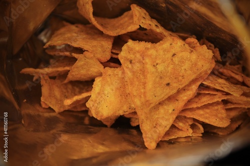 Nacho corn chips inside view of a packet. Baked Tortillas.