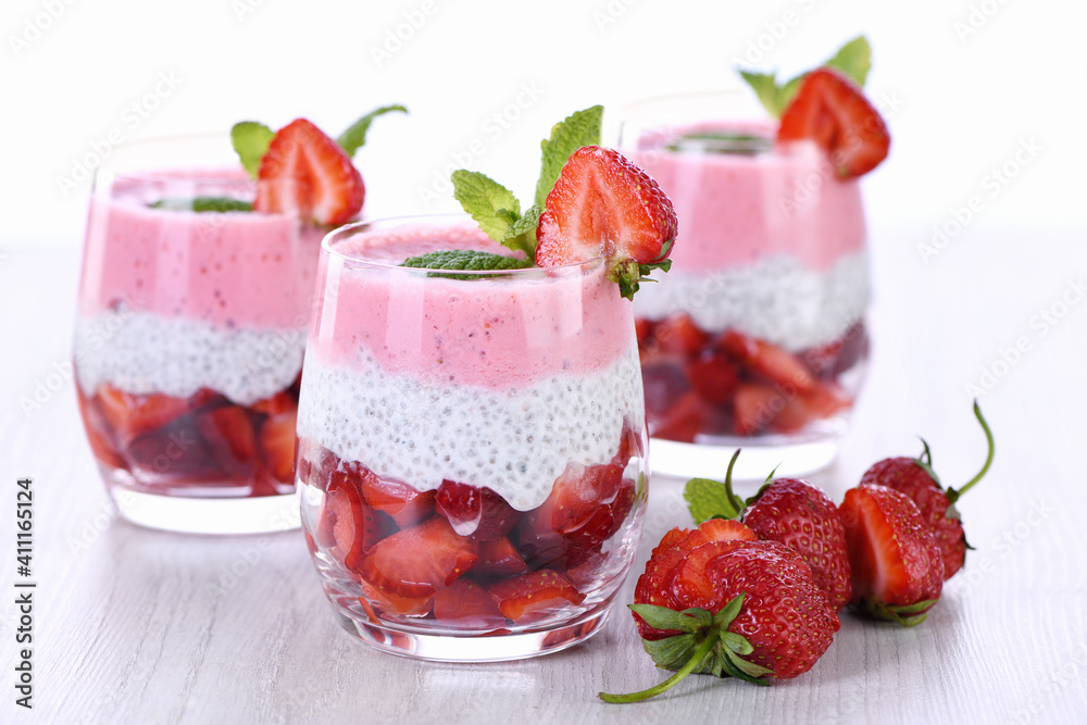 Strawberry dessert with milk vanilla chia and fresh strawberry pieces Strawberry dessert with milk vanilla chia and fresh strawberry pieces