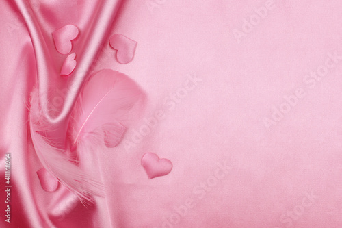 Pink folded satin fabric wi...